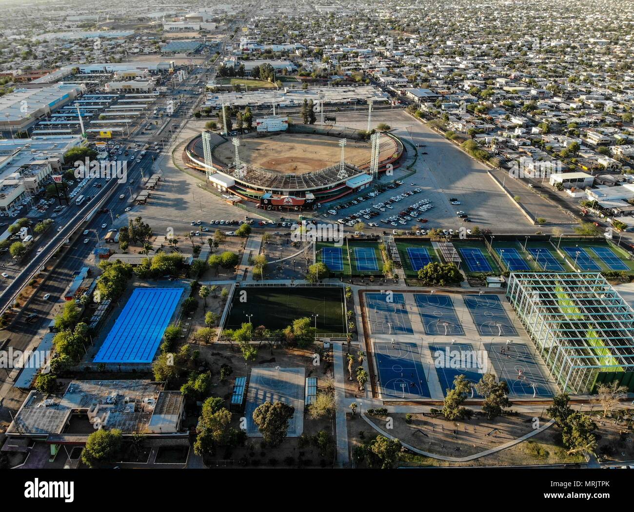 Aerial view of Hector Espino baseball stadium and sports complex, public  park and recreational space with pool, tennis courts and basketball. .  Photo Stock Photo - Alamy