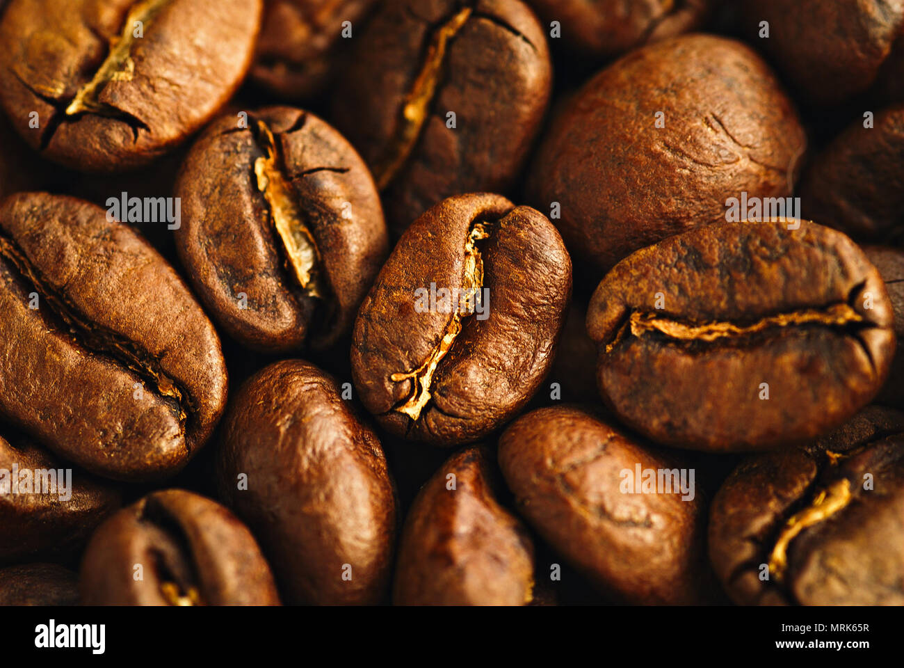Roasted coffee beans, can be used as a background Stock Photo - Alamy