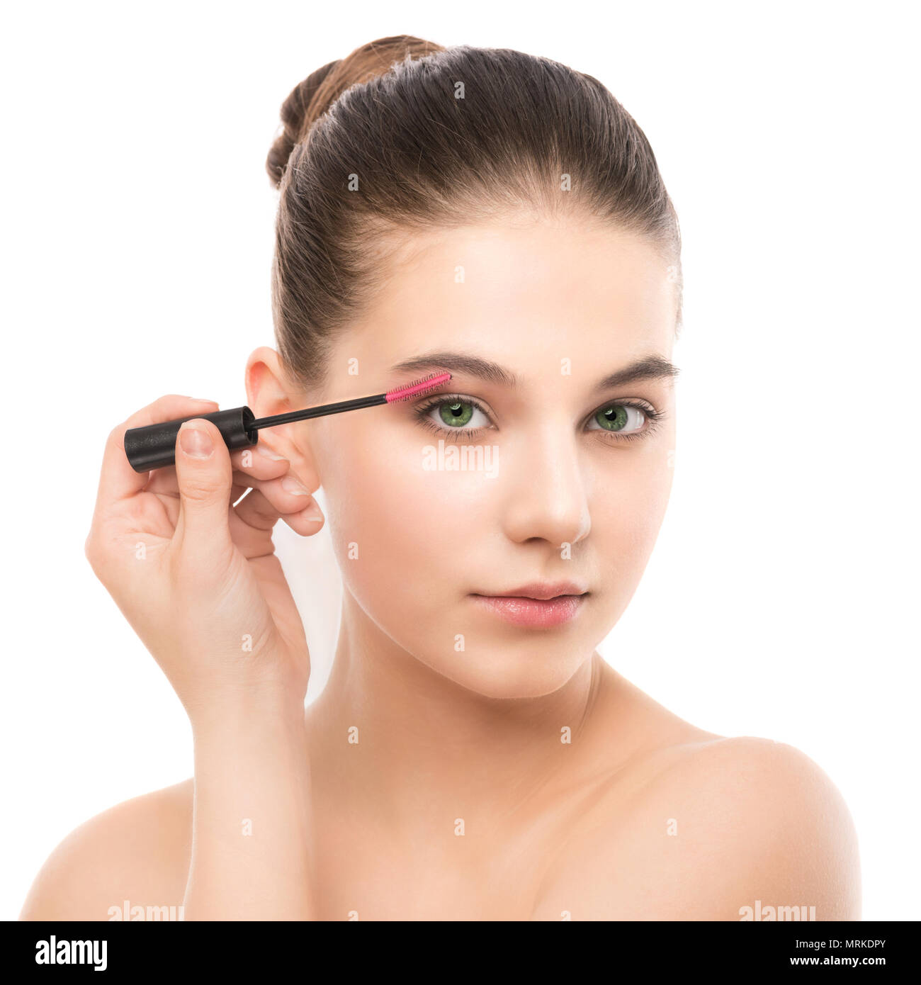 Eye make up apply. Mascara applying closeup, long lashes. makeup brush. Isolated. Stock Photo