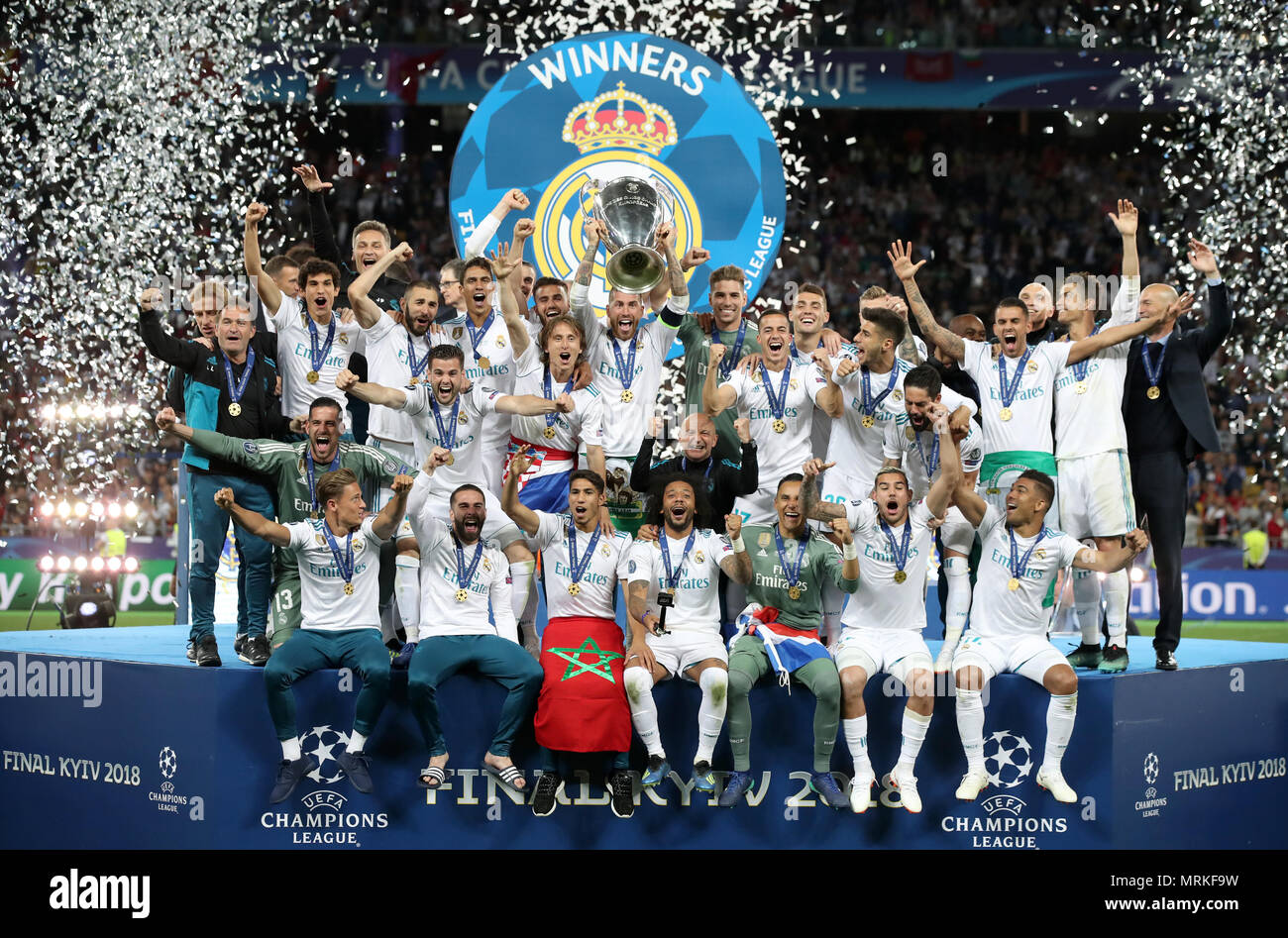Real Madrid celebrate with the trophy after winning the UEFA Champions ...