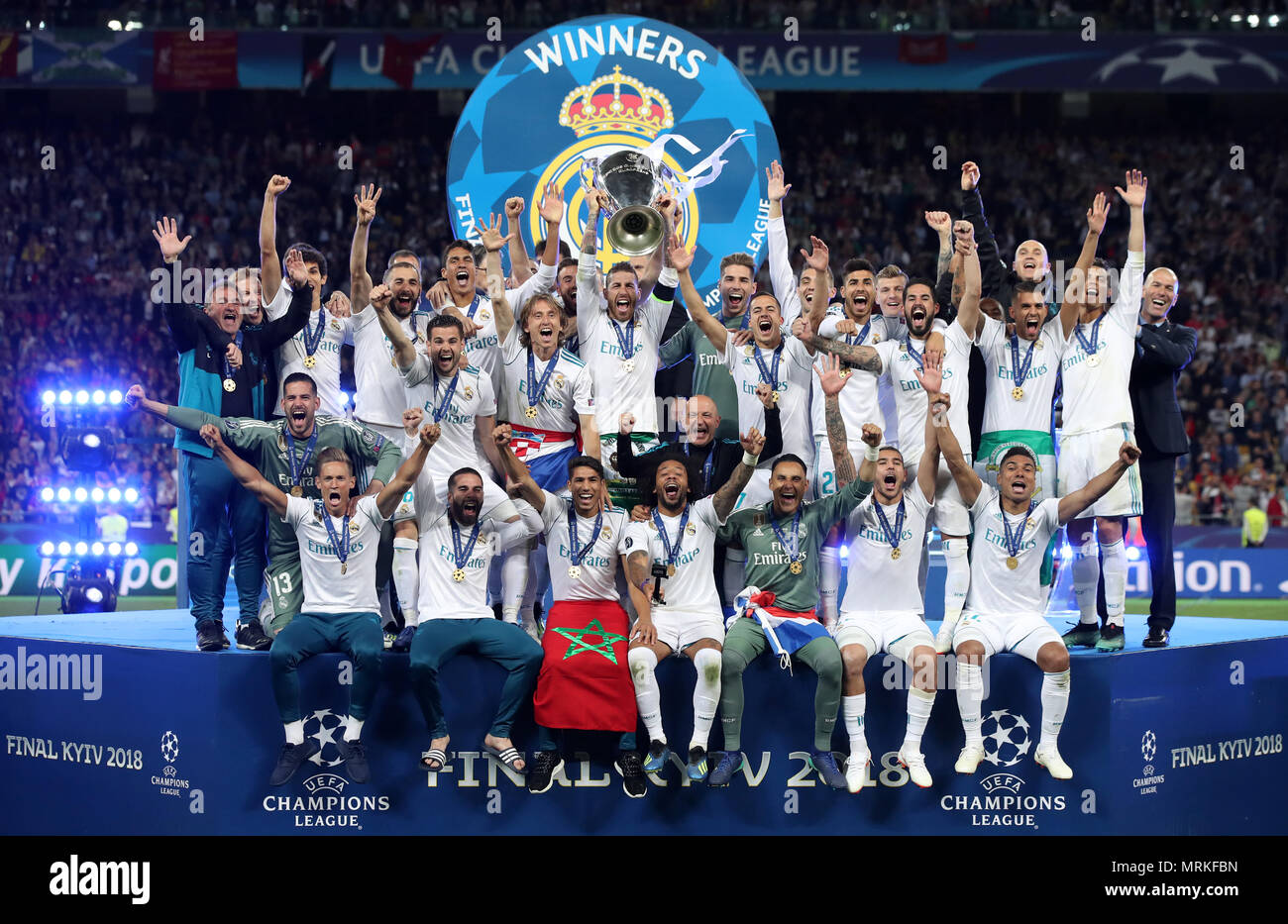 Real Madrid celebrate with the trophy after winning the UEFA Champions ...