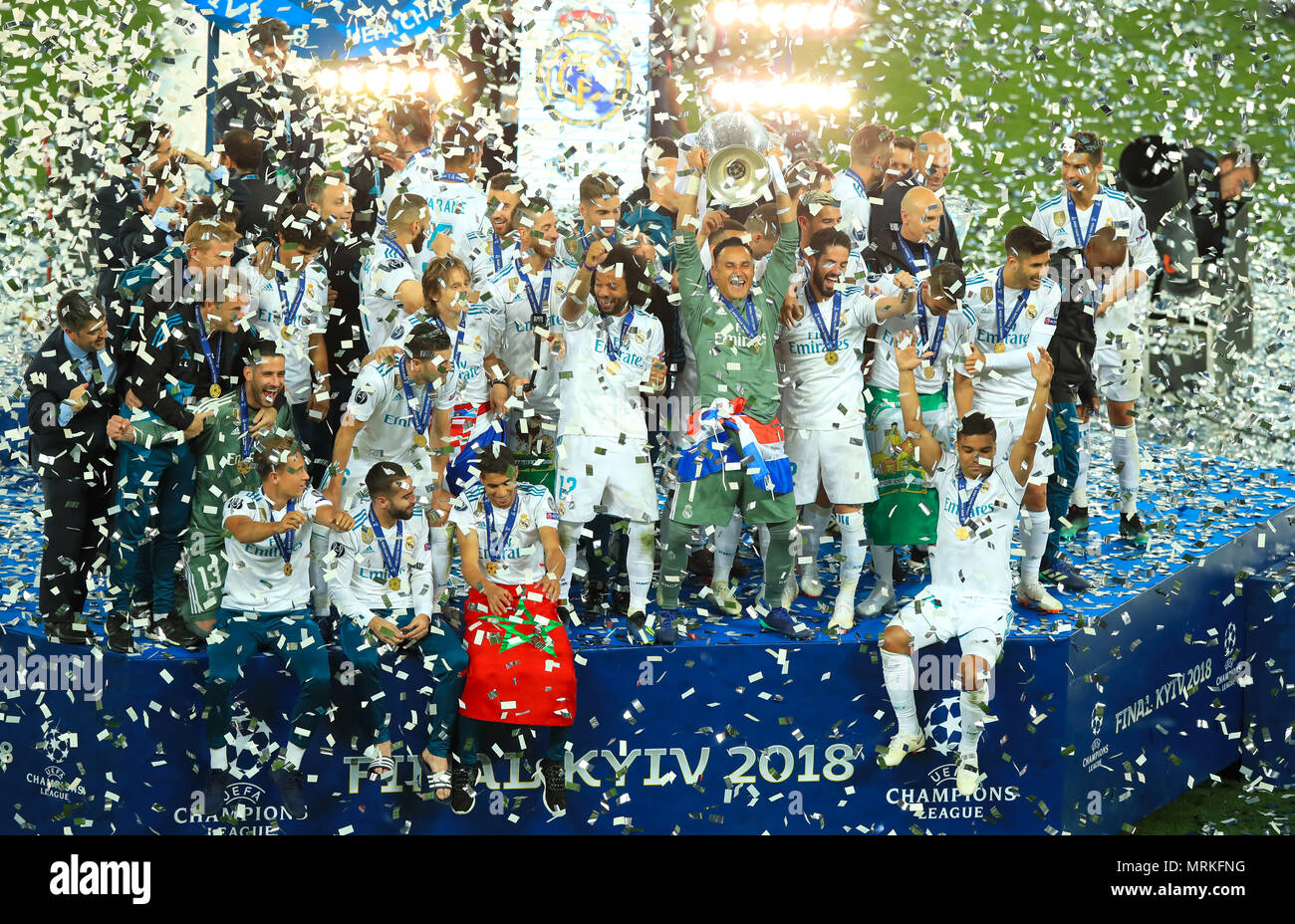 Real Madrid players celebrate with the trophy after winning the UEFA ...