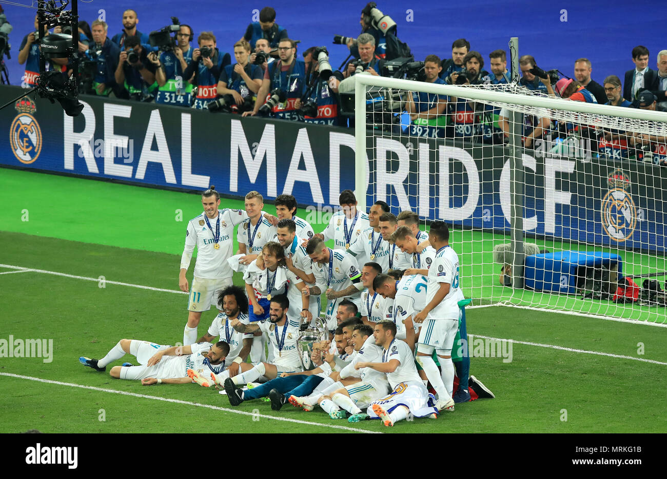 Real Madrid players celebrate with the trophy after winning the UEFA Champions League Final at the NSK Olimpiyskiy Stadium, Kiev. Stock Photo