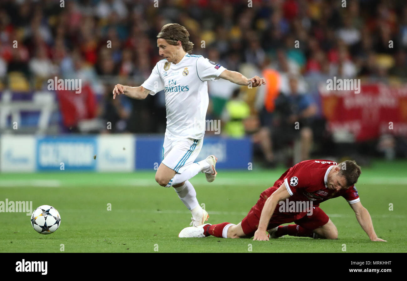 Real Madrid's Luka Modric (left) and Liverpool's James Milner battle for the ball during the UEFA Champions League Final at the NSK Olimpiyskiy Stadium, Kiev. Stock Photo