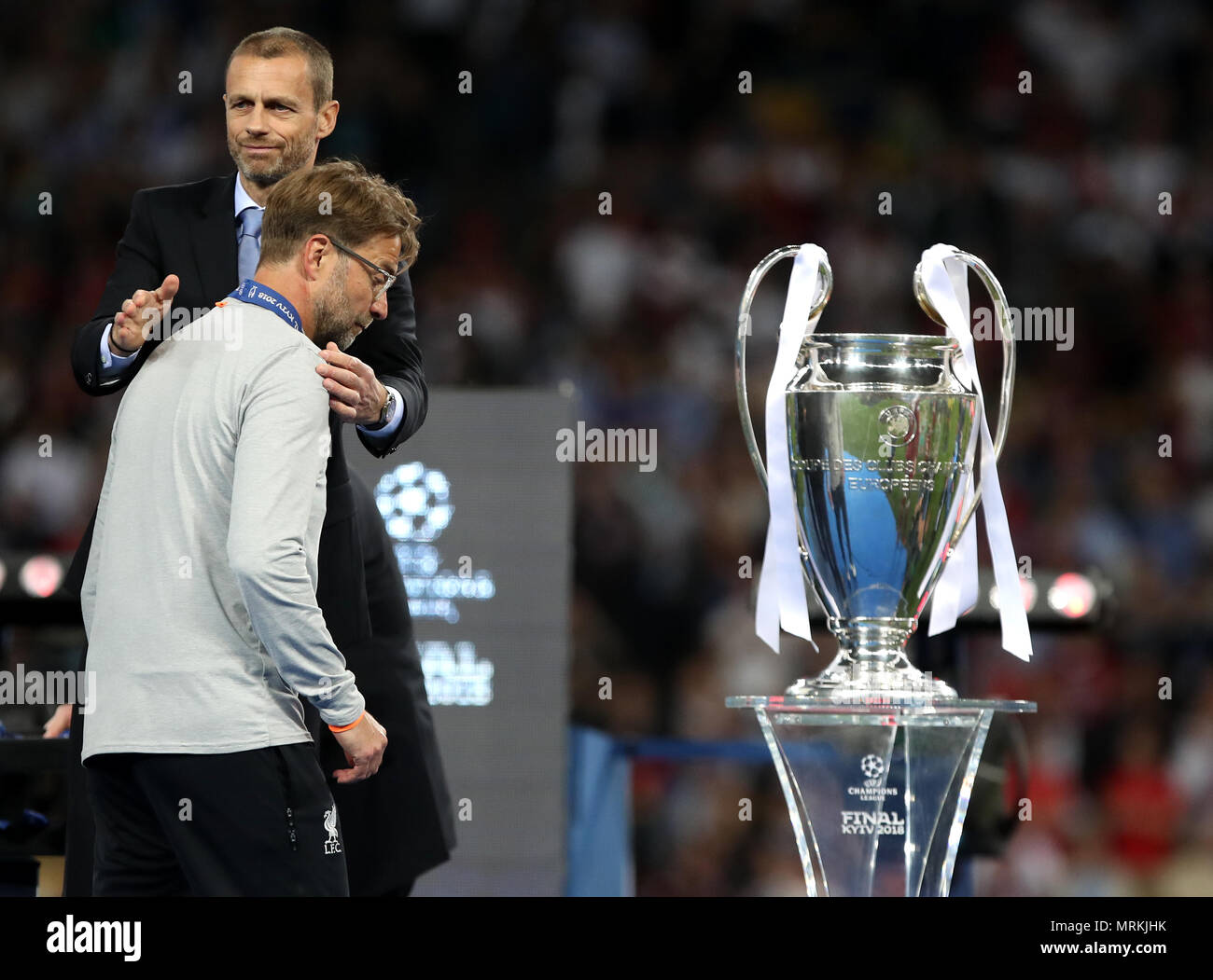 Liverpool Manager Jurgen Klopp Walks Past The Trophy After The Uefa Champions League Final At The Nsk Olimpiyskiy Stadium Kiev Stock Photo Alamy