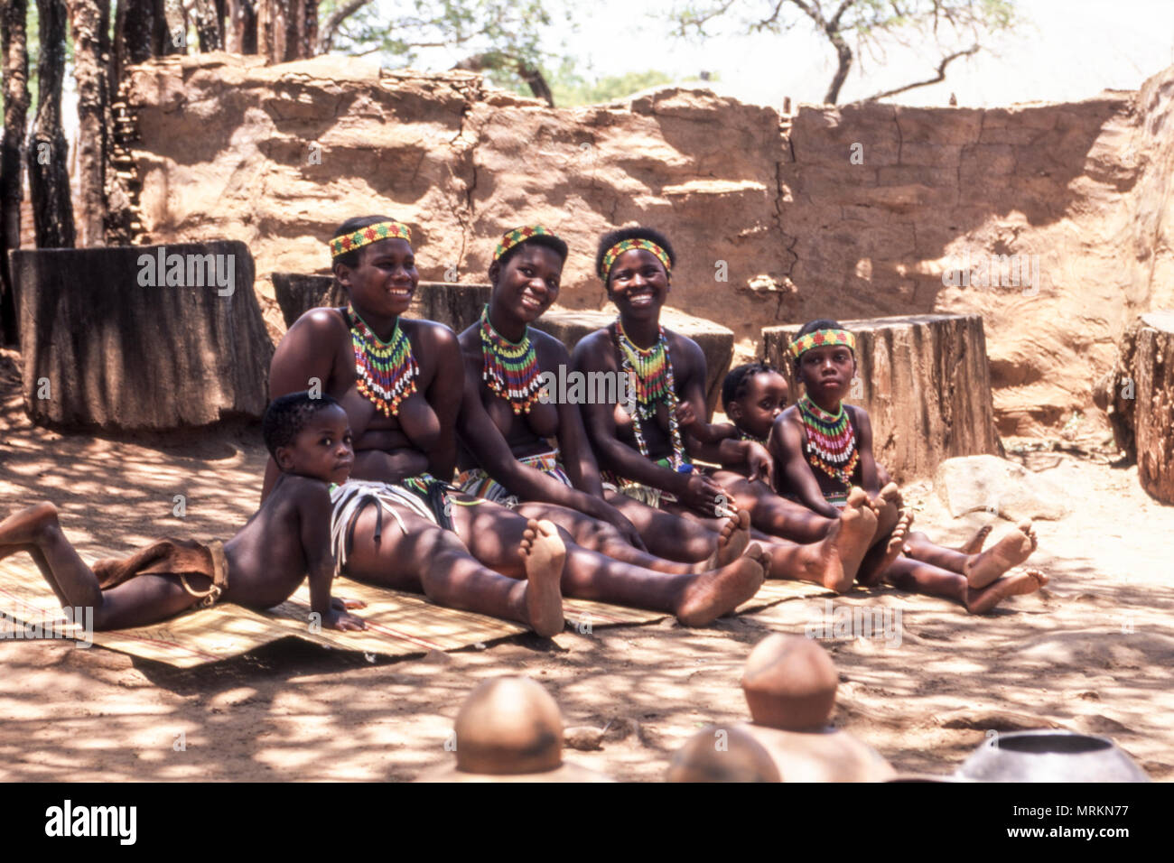 Zulu people at the Shakaland Zulu Village, Nkwalini Valley, Kwazulu Natal, South Africa. Stock Photo