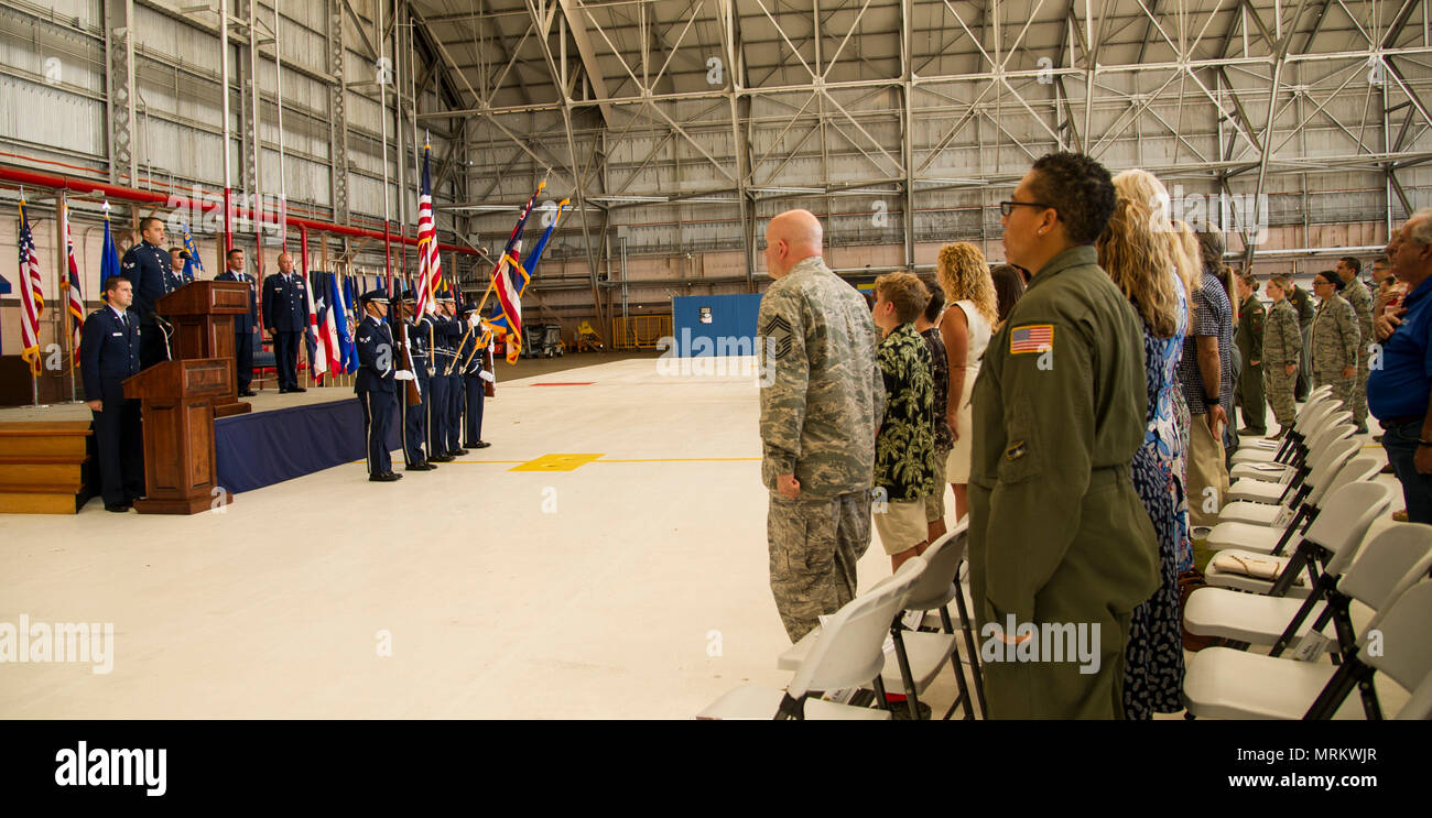 Members of the Honor Guard post the colors for the National Anthem and ...