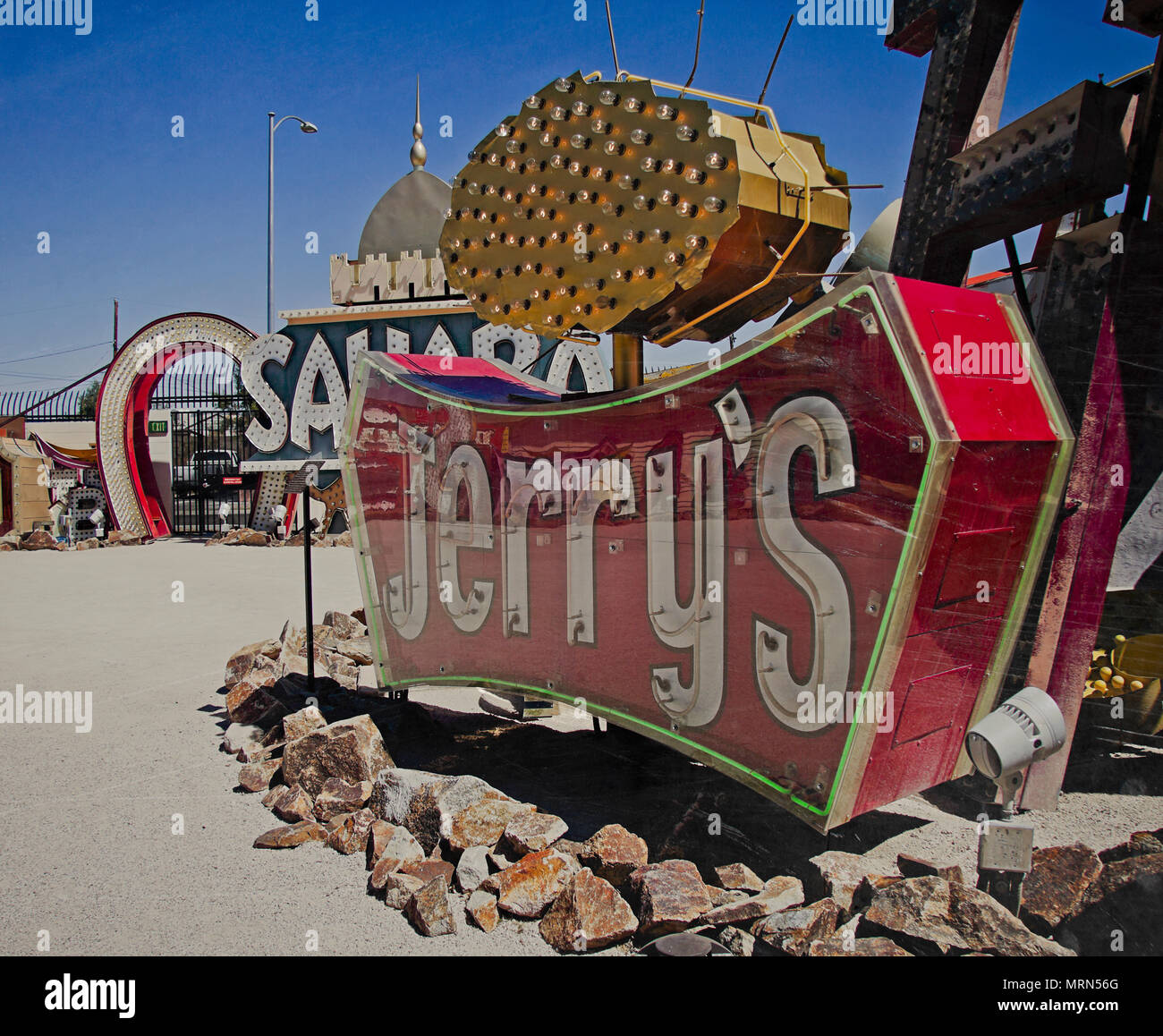 Old Neon Signs with retro construction designs are displayed at Neon Boneyard Museum, Las Vegas, Nevada. It is a popular tourist attraction. Stock Photo