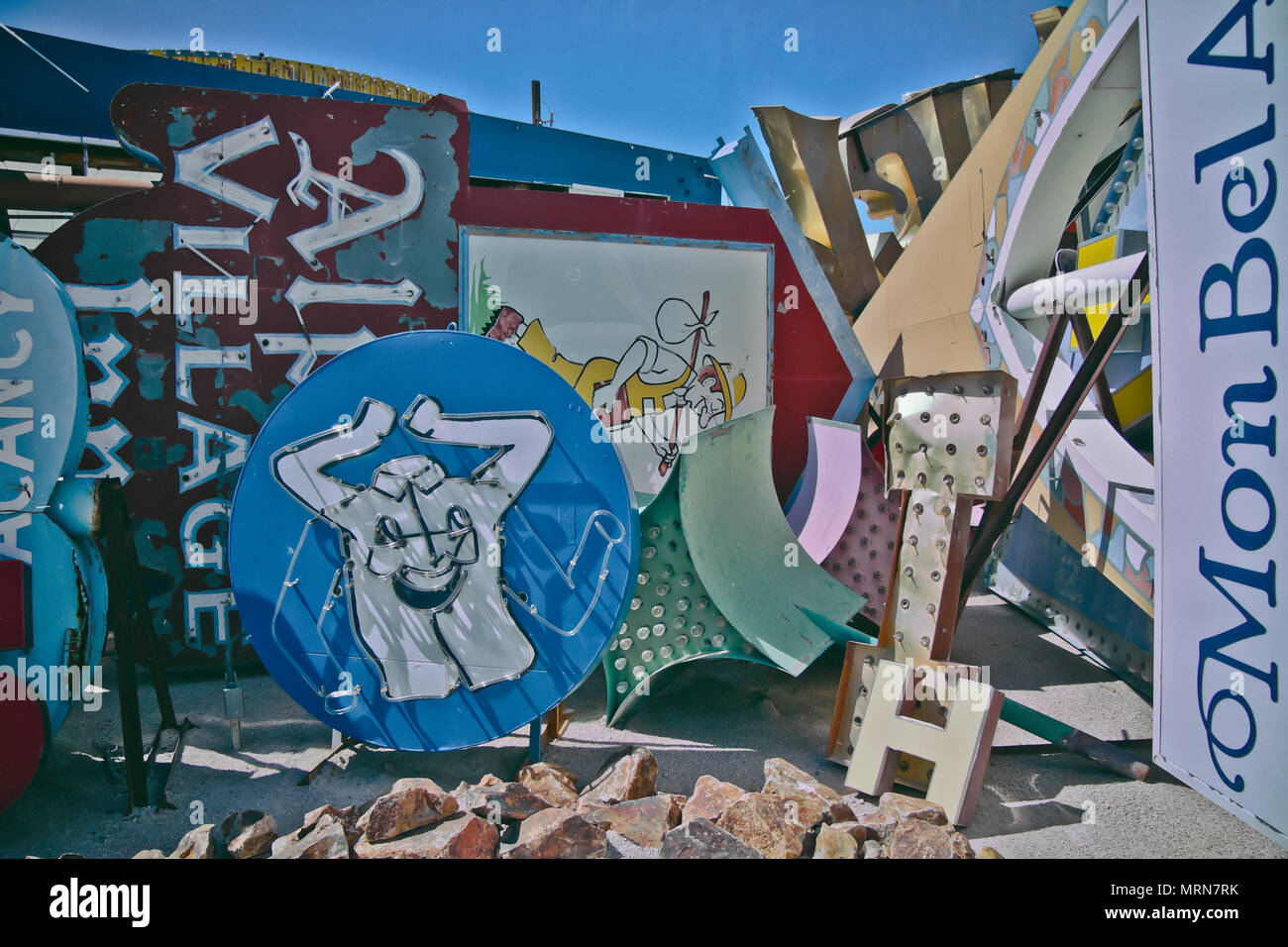 Old Neon Signs with retro construction designs are displayed at Neon Boneyard Museum, Las Vegas, Nevada. It is a popular tourist attraction. Stock Photo