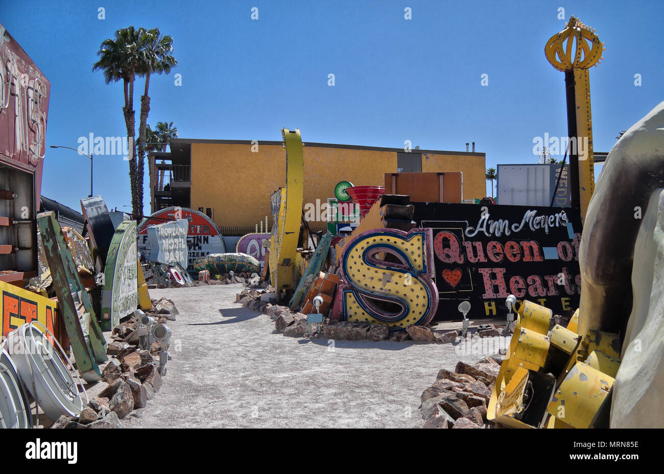 Old Neon Signs with retro construction designs are displayed at Neon Boneyard Museum, Las Vegas, Nevada. It is a popular tourist attraction. Stock Photo