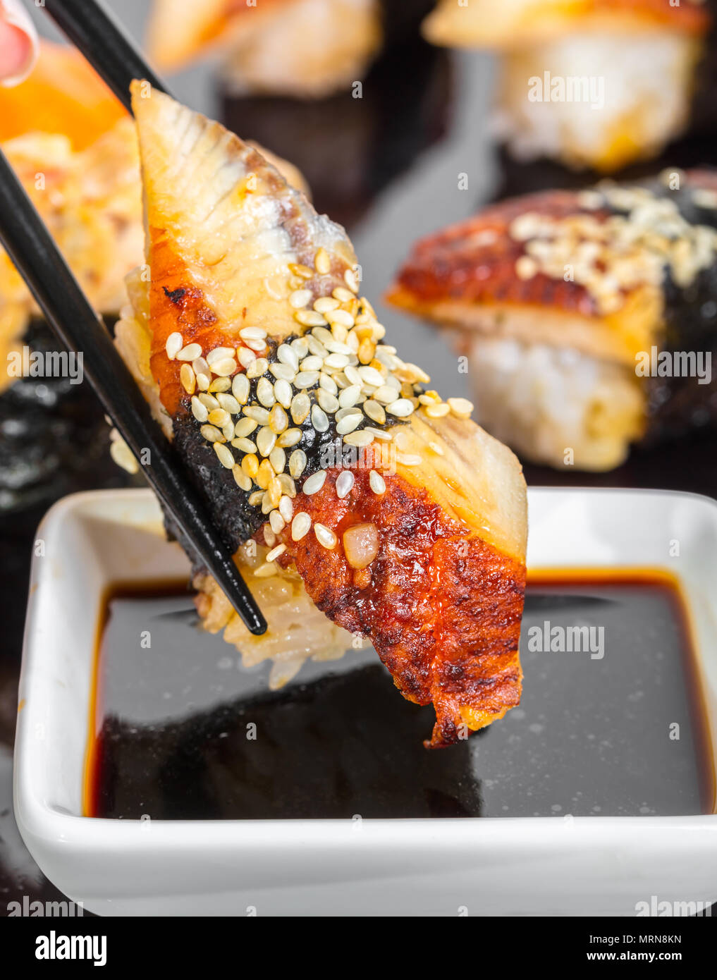 Japanese cuisine, sushi with eel in soy sauce Stock Photo - Alamy