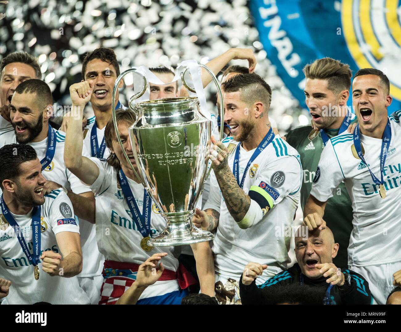 Kiev. 26th May, 2018. Sergio Ramos (C) of Real Madrid holds the trophy  after winning the UEFA Champions League final match between Liverpool and Real  Madrid in Kiev, Ukraine on May 26,