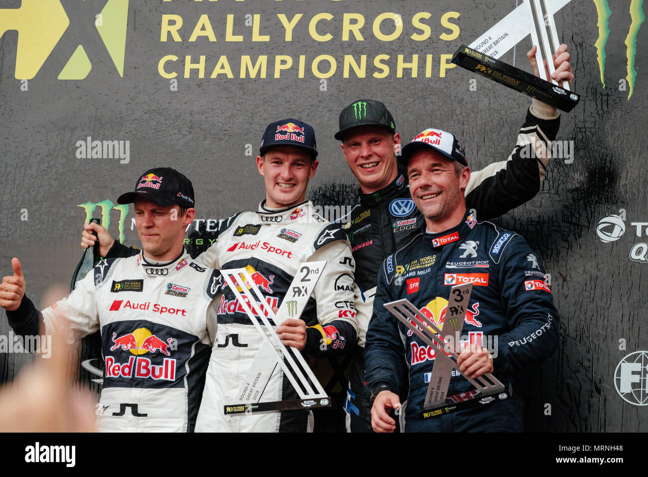 Towcester, Northamptonshire, UK. 27th May, 2018. FIA World Rallycross drivers' podium (Left to Right) Mattias Ekstrom (SWE), Andreas Bakkerud (NOR), Johan Kristoffersson (SWE) and Sebastien Loeb (FRA) on the podium of the Cooper Tires World RX of Great Britain at Silverstone (Photo by Gergo Toth / Alamy Live News) Stock Photo