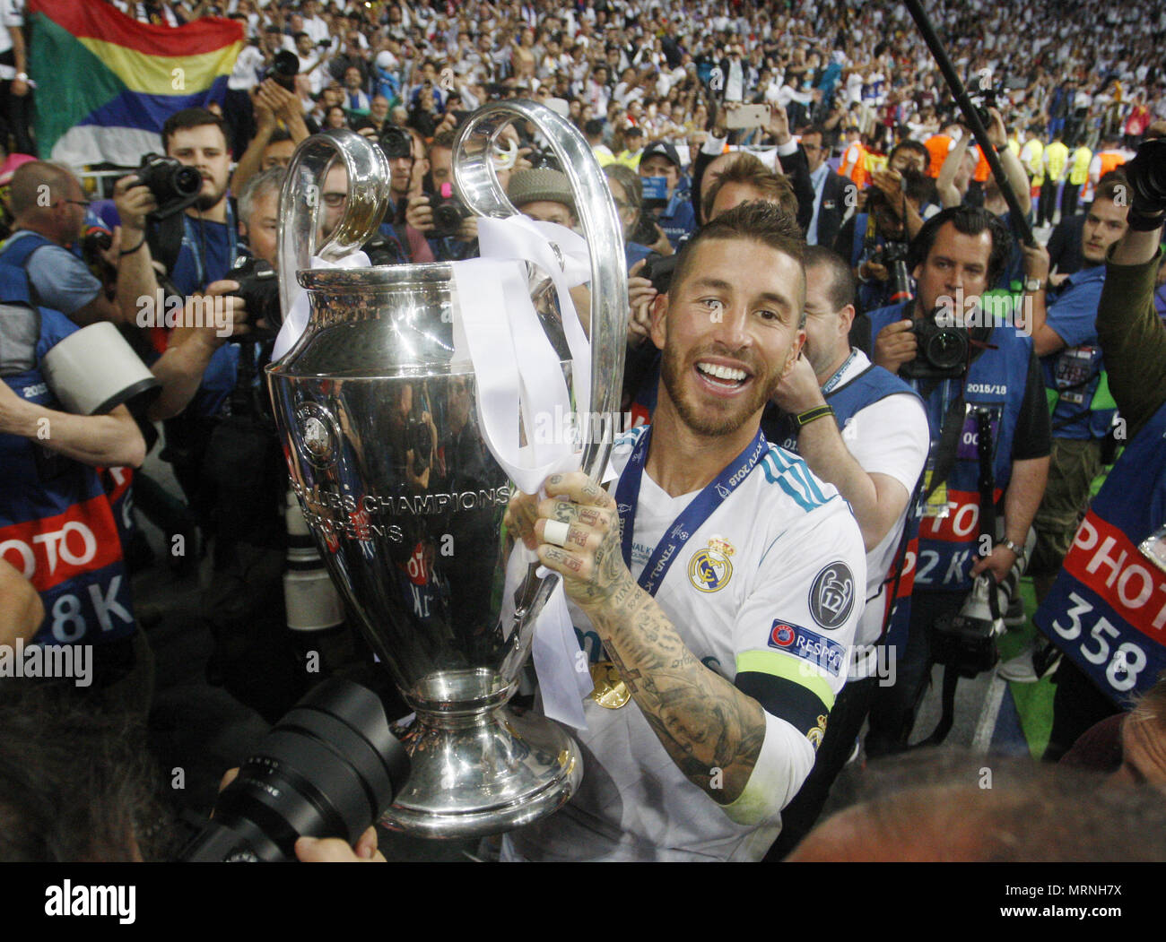 Kiev, Ukraine. 27th May, 2018. SERGIO RAMOS of Real Madrid celebrates with the trophy after winning the UEFA Champions League final soccer match Real Madrid vs Liverpool FC, at the NSC Olimpiyskiy stadium in Kiev on 26 May 2018. Credit: Serg Glovny/ZUMA Wire/Alamy Live News Stock Photo