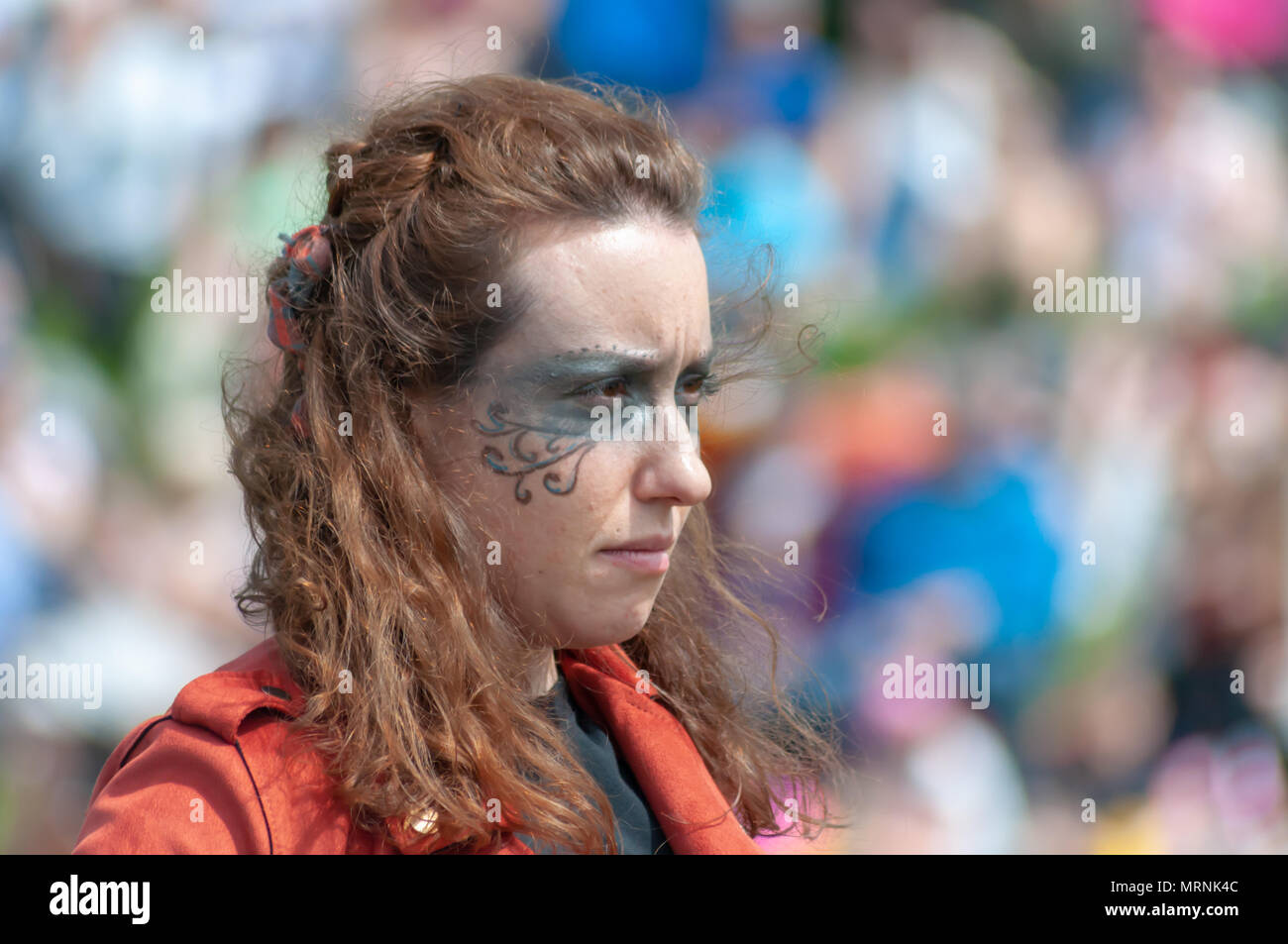 Glasgow , Scotland, UK. 27th May, 2018. Female musician at the Carmunnock International Highland Games which celebrates  traditional Scottish culture with a street procession of Chieftain and athletes, heavy events including stone putt, challenge caber & sheaf pitch, other events include log boxing, stick fighting & wrestling, music events include Eaglesham Fiddlers, St. Francis Pipe Band and Highland Dancing and is held in the picturesque conservation village of Carmunnock. Credit: Skully/Alamy Live News Stock Photo