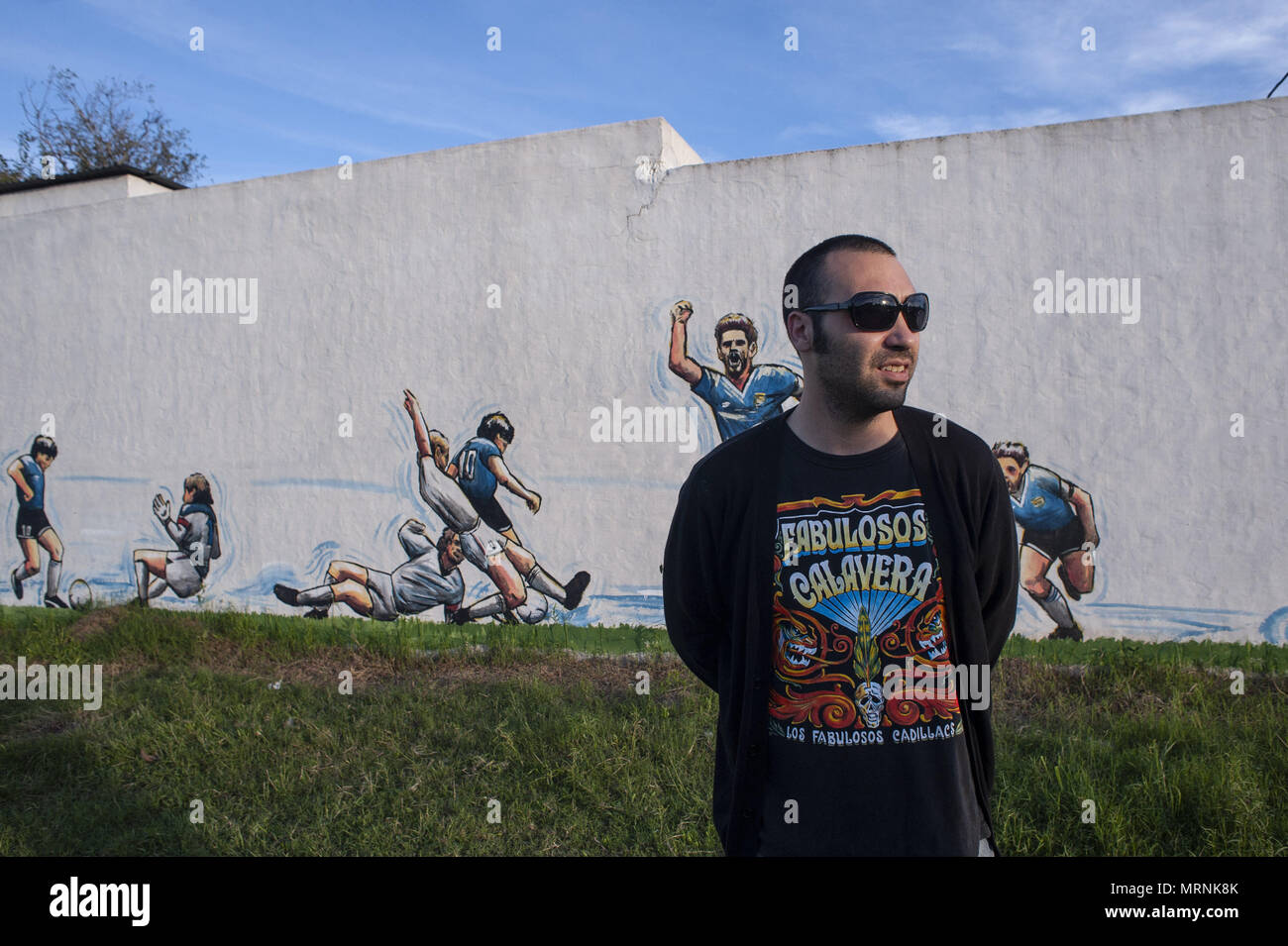 May 12, 2018 - Buenos Aires, Buenos Aires, Argentina - On a wall in a little country city, artist Ariel Bertolotti created a mural in which two symbols of different Argentinian football eras coexist: Diego Armando Maradona and Lionel Messi, the two greatest Argentinian players of all time, both considered at their own time the best of the world. The mural depicts the famous goal Maradona scored against England in 1986 Mexico World cup, a goal considered by many the best of all time, with a twist, the player celebrating the goal isn't Maradona but Messi. (Credit Image: © Patricio Murphy via ZUM Stock Photo
