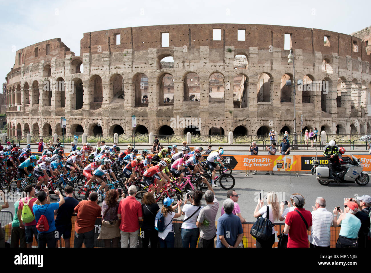 Rome, Italy. 27th May 2018. The pack of cyclists pedal past Rome's Colosseum, during the last stage of the Giro d'Italia cycling race, in Rome, Sunday, May 27, 2018. Chris Froome effectively sealed victory in the Giro d'Italia on Saturday by holding his only remaining challenger in check up the final climb of the three-week race. Credit: Massimo Valicchia/Alamy Live News Stock Photo