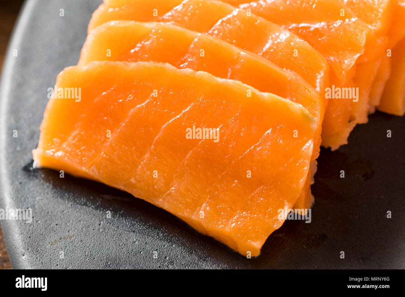 Raw Japanese Salmon Sashimi with Wasabi and Nigiri Stock Photo