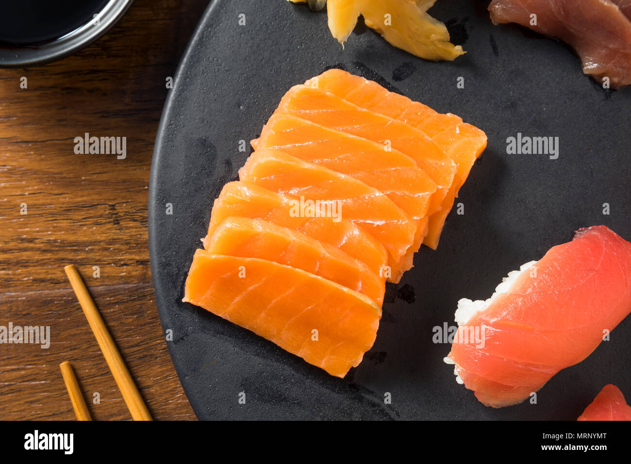 Raw Japanese Salmon Sashimi with Wasabi and Nigiri Stock Photo
