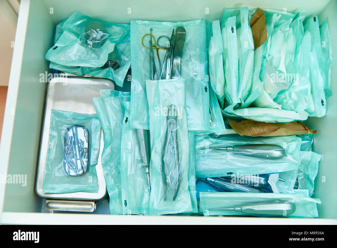 Sealed Dental Instruments Lie In The Drawer Close Up Stock Photo