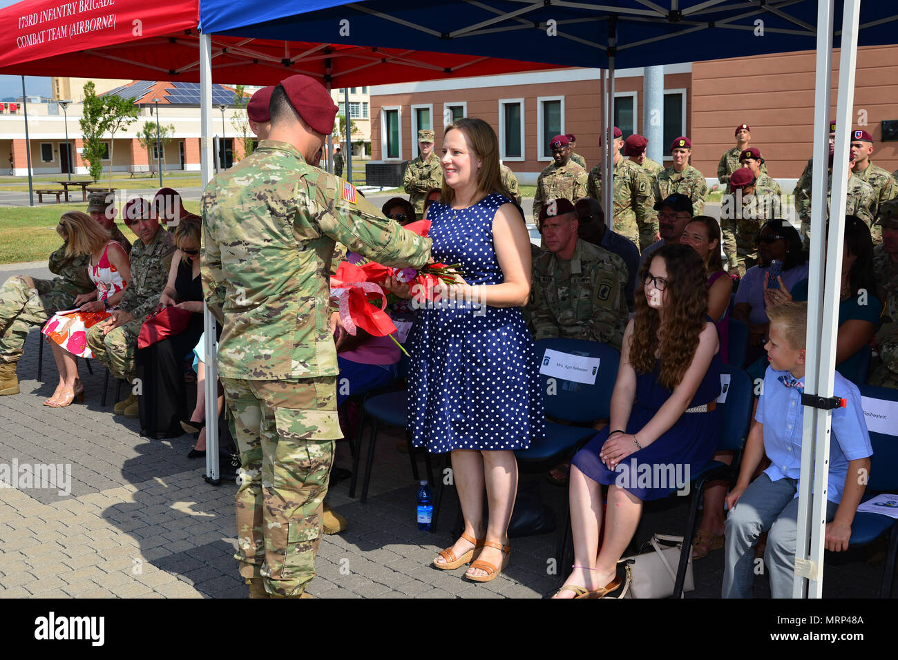 Wife of the Lt. Col. Jeffrey L. Reibestein (right), outgoing commander
