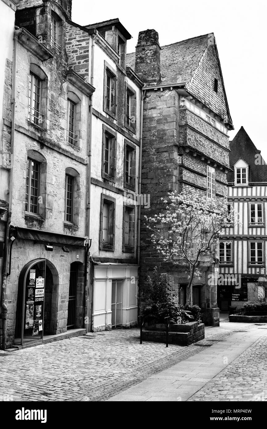 Half-timbered and stone buildings in the old medieval city of Quimper, Brittany, France. Black & white. B&W Stock Photo