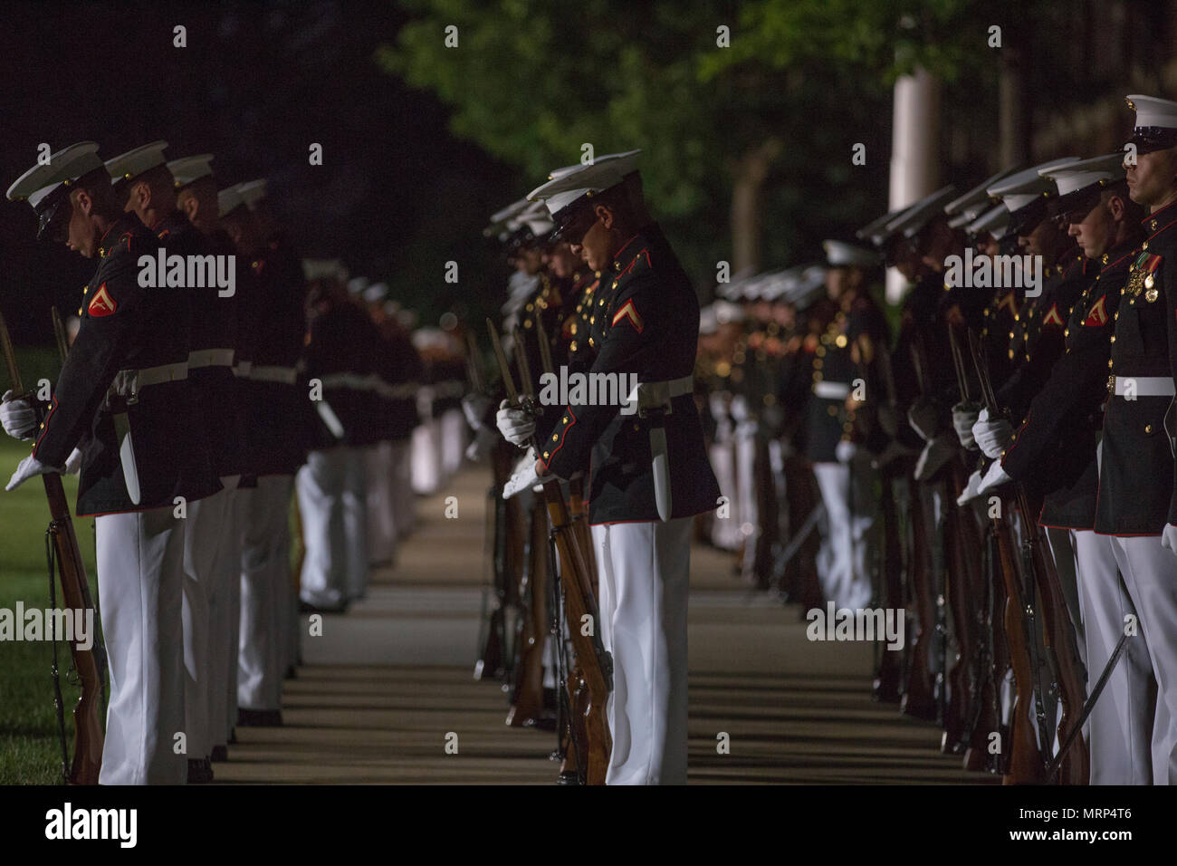 U.S. Marines with Marine Barracks Washington perform during an evening parade, Marine Barracks Washington, Washington, D.C., June 23, 2017. Evening parades are held as a means of honoring senior officials, distinguished citizens and supporters of the Marine Corps. (U.S. Marine Corps photo by Lance Cpl. Stephon L. McRae) Stock Photo