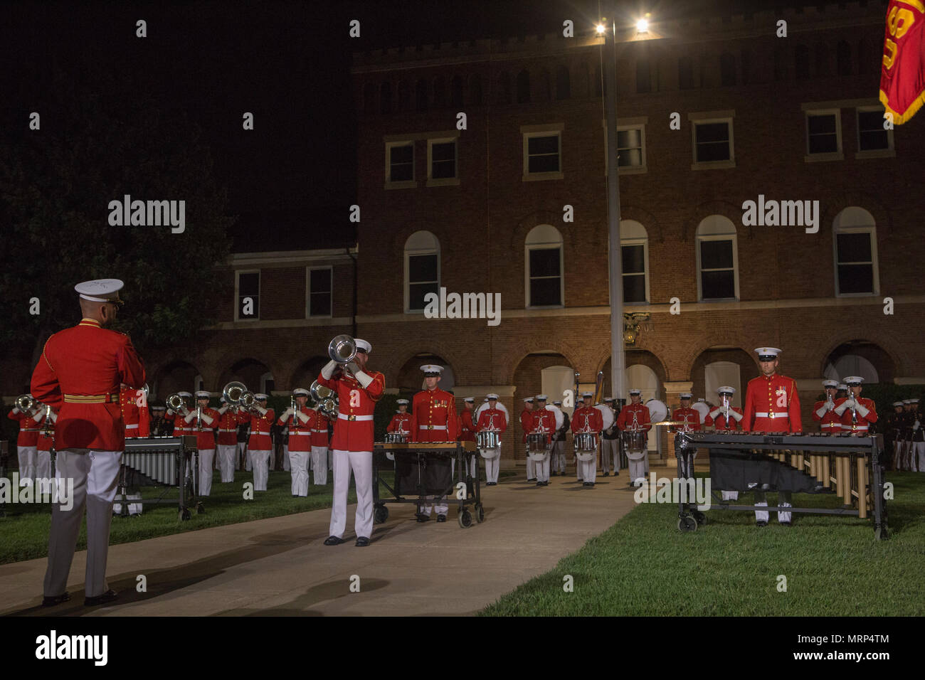 U.S. Marines with the U.S. Marine Drum and Bugle Corps perform during an evening parade at Marine Barracks Washington, Washington, D.C., June 9, 2017. Evening parades are held as a means of honoring senior officials, distinguished citizens and supporters of the Marine Corps. (U.S. Marine Corps photo by Lance Cpl. Stephon L. McRae) Stock Photo