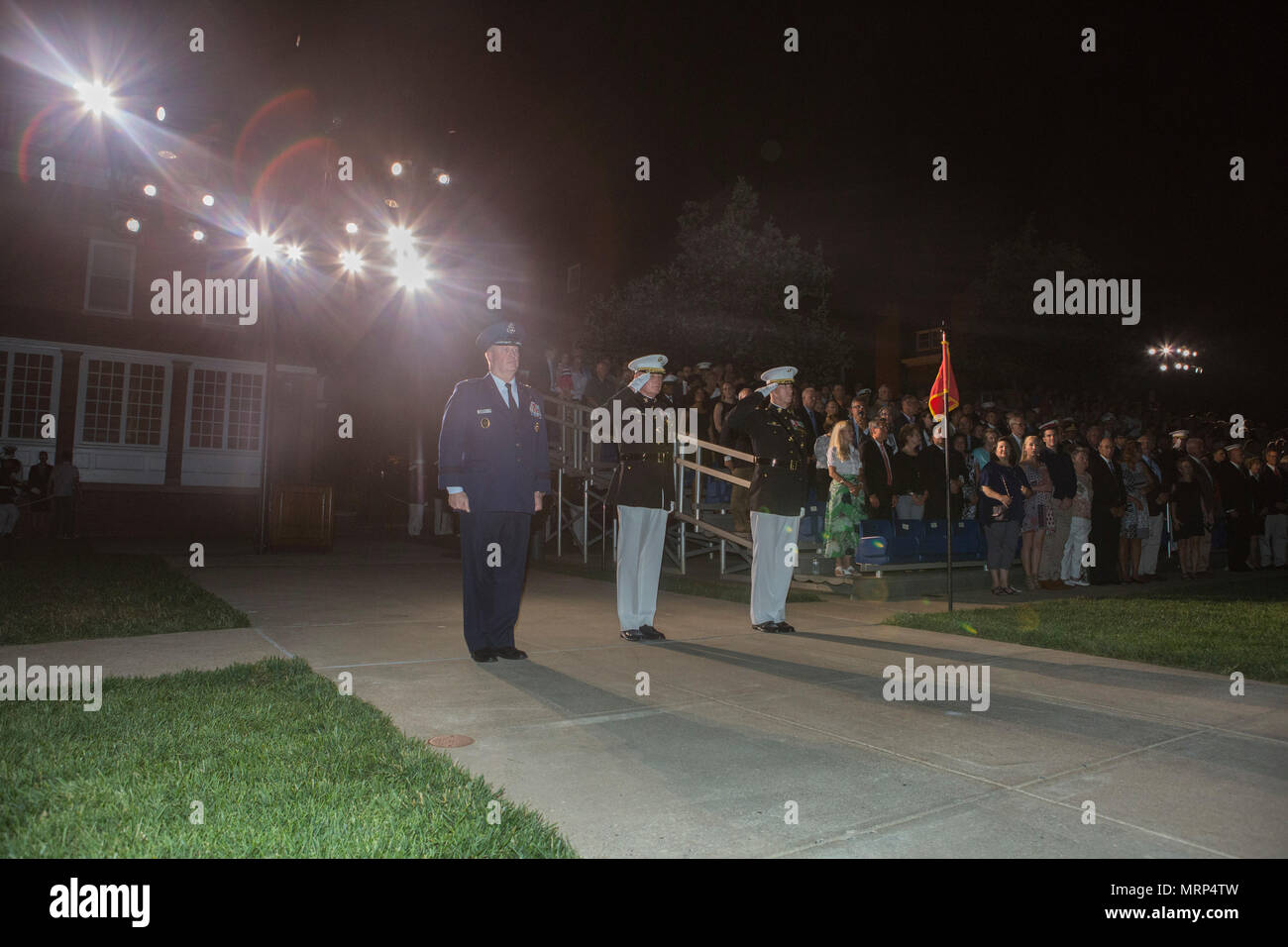 From left, U.S. Air Force Lt. Gen. Thomas J. Trask, vice commander of Headquarters U.S. Special Operations Command (SOCOM); Director Marine Corps Staff Lt. Gen. James B. Laster; and Col. Tyler J. Zagurski, commanding officer, Marine Barracks Washington, render honors during an evening parade at Marine Barracks Washington, Washington, D.C., June 23, 2017. Evening parades are held as a means of honoring senior officials, distinguished citizens and supporters of the Marine Corps. (U.S. Marine Corps photo by Lance Cpl. Stephon L. McRae) Stock Photo