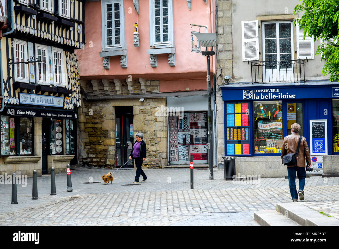 Sunday stollers on a casual walk through the historic heart of Quimper, Brittany, France. Stock Photo