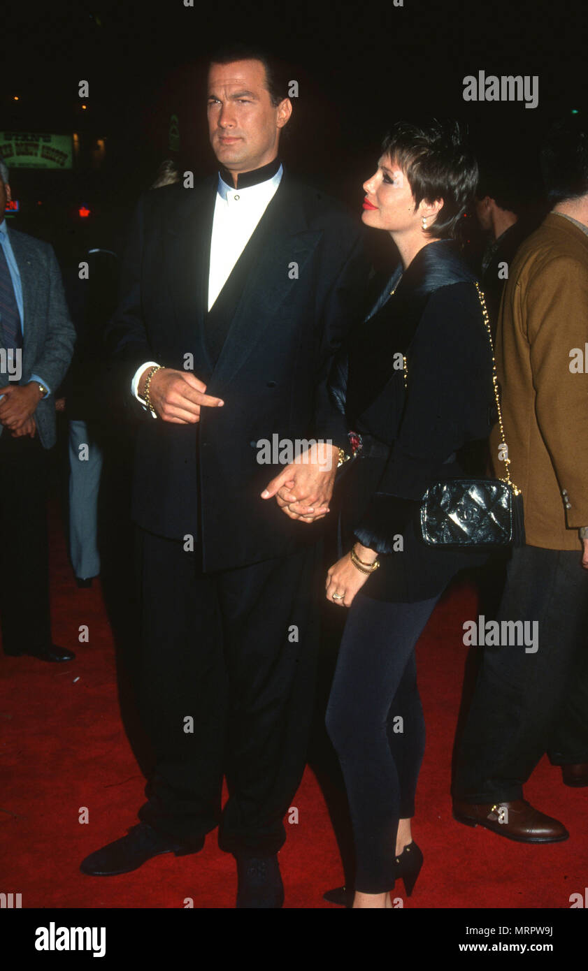LOS ANGELES, CA - APRIL 10: (L-R) Actor Steven Seagal and actress Kelly