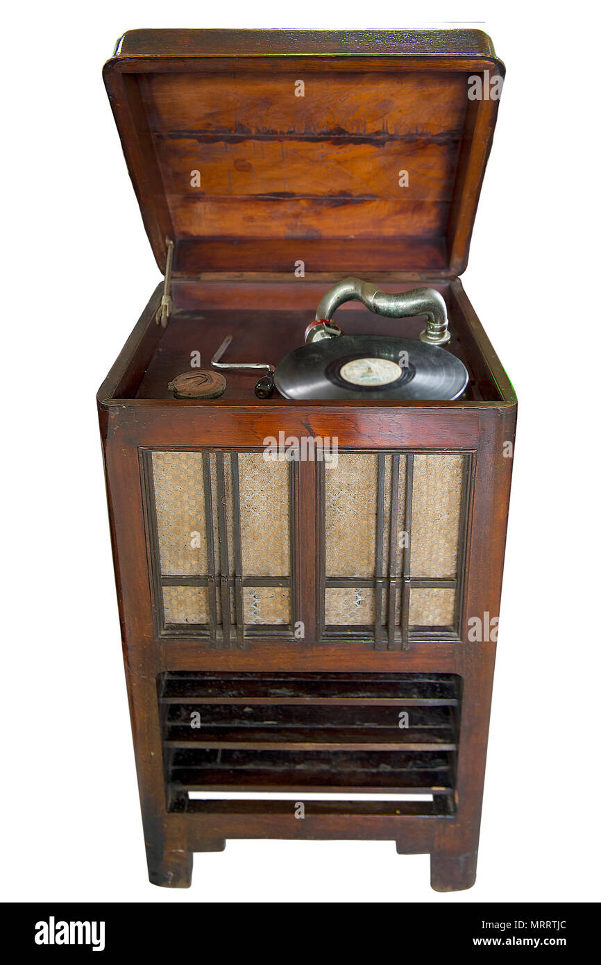 Vintage Vinyl Record Player : old retro vinyl record player set in wooden  cabinet on isolated white background with clipping path Stock Photo - Alamy