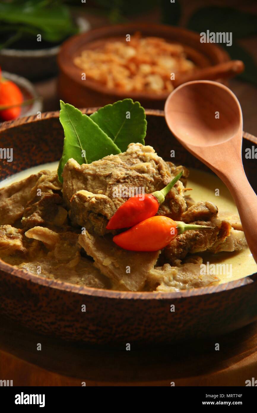 Gulai Kambing. Traditional Javanese mutton curry soup. Stock Photo
