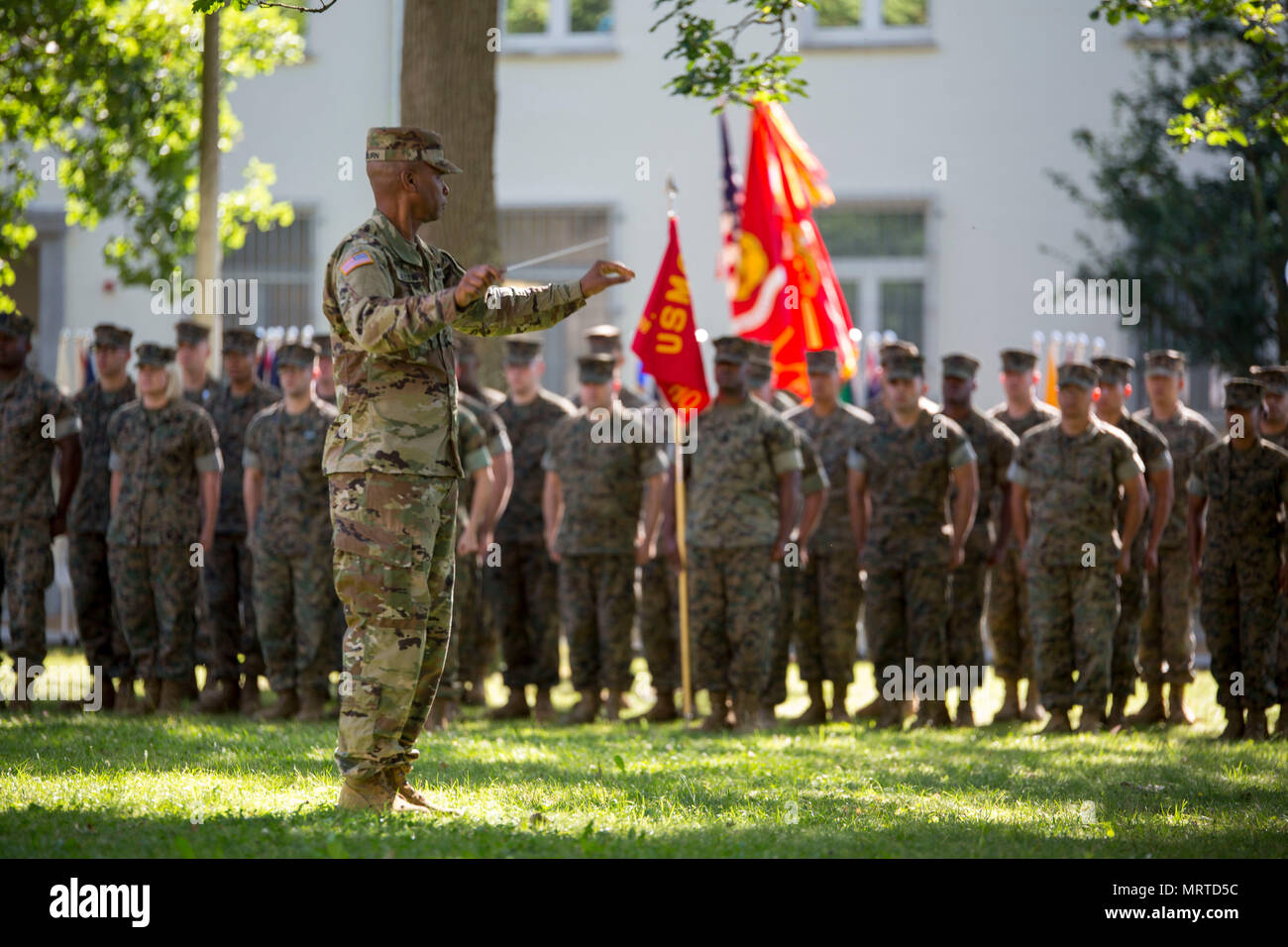 U.S. soldier conducts the U.S. Army Europe Band during change of ...