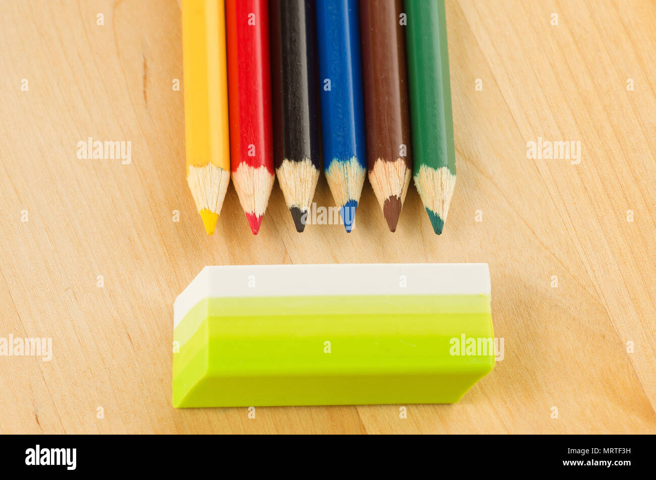 many sharp sharpened colored pencils close-up on the background Stock Photo