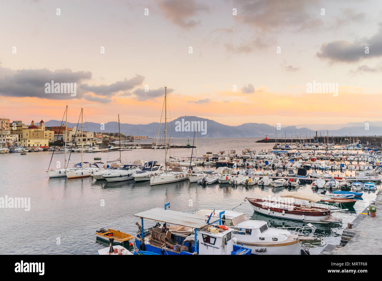 Boats and yatchs in the port of Torre del Greco in the gulf of Naples, on background Sorrento peninsula, Campania, Italy, Europe Stock Photo