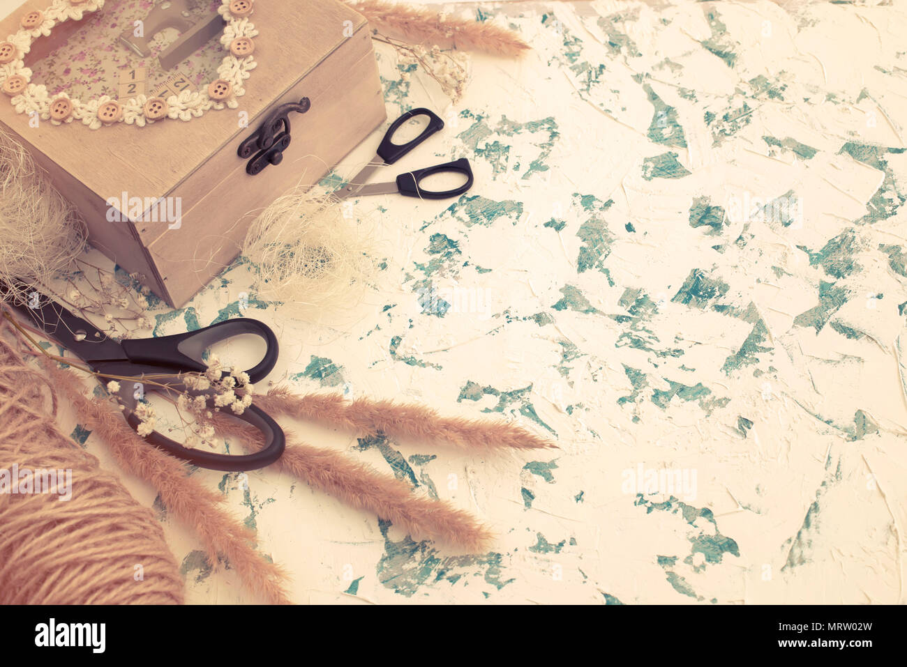 Wooden box in Vintage style on textured background. Flat lay top view