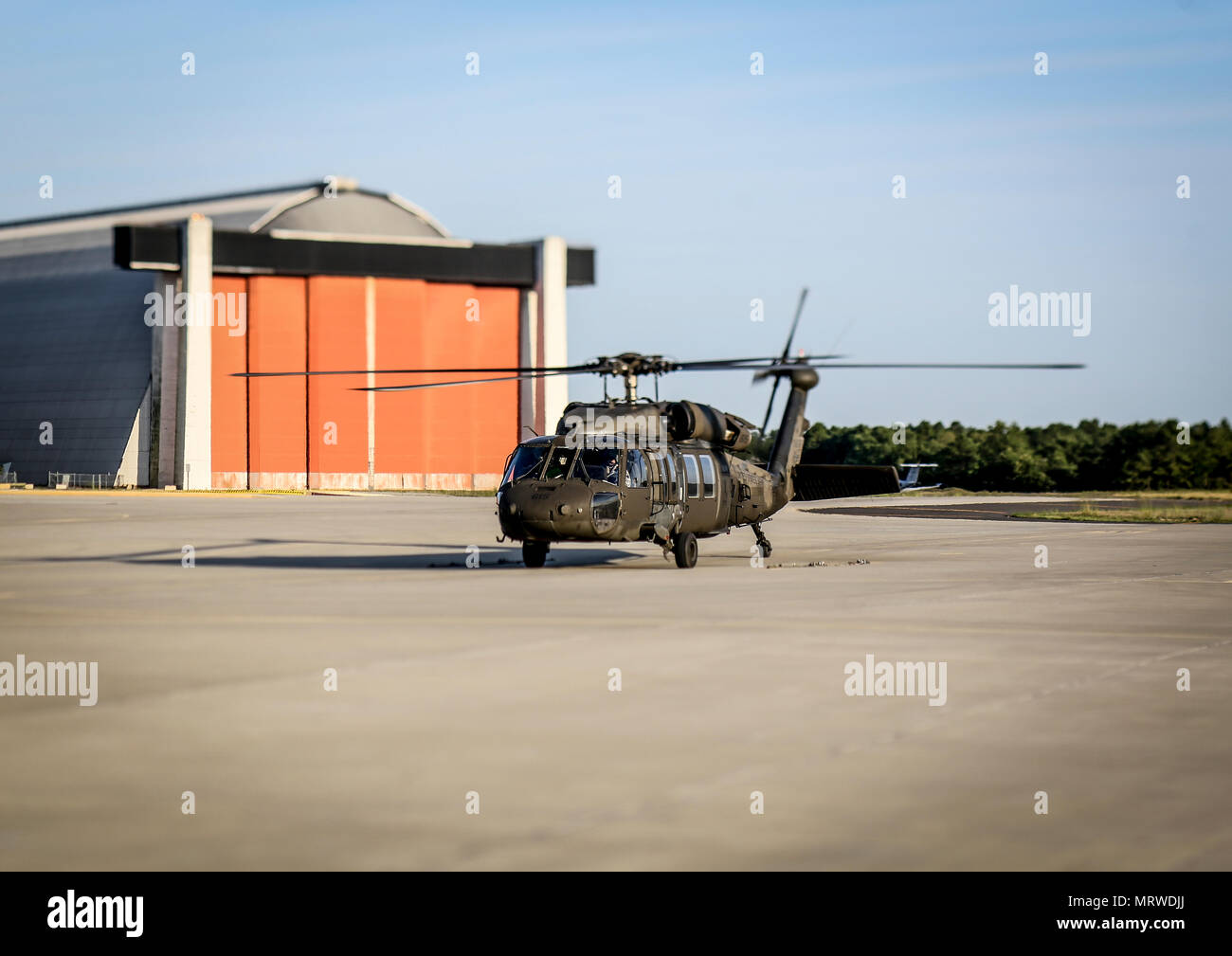 A 1-150th Assault Helicopter Battalion UH-60 Black Hawk helicopter returns from a training flight to Joint Base McGuire-Dix-Lakehurst, N.J., June 28, 2017. (U.S. Air National Guard photo by Master Sgt. Matt Hecht/Released) Stock Photo