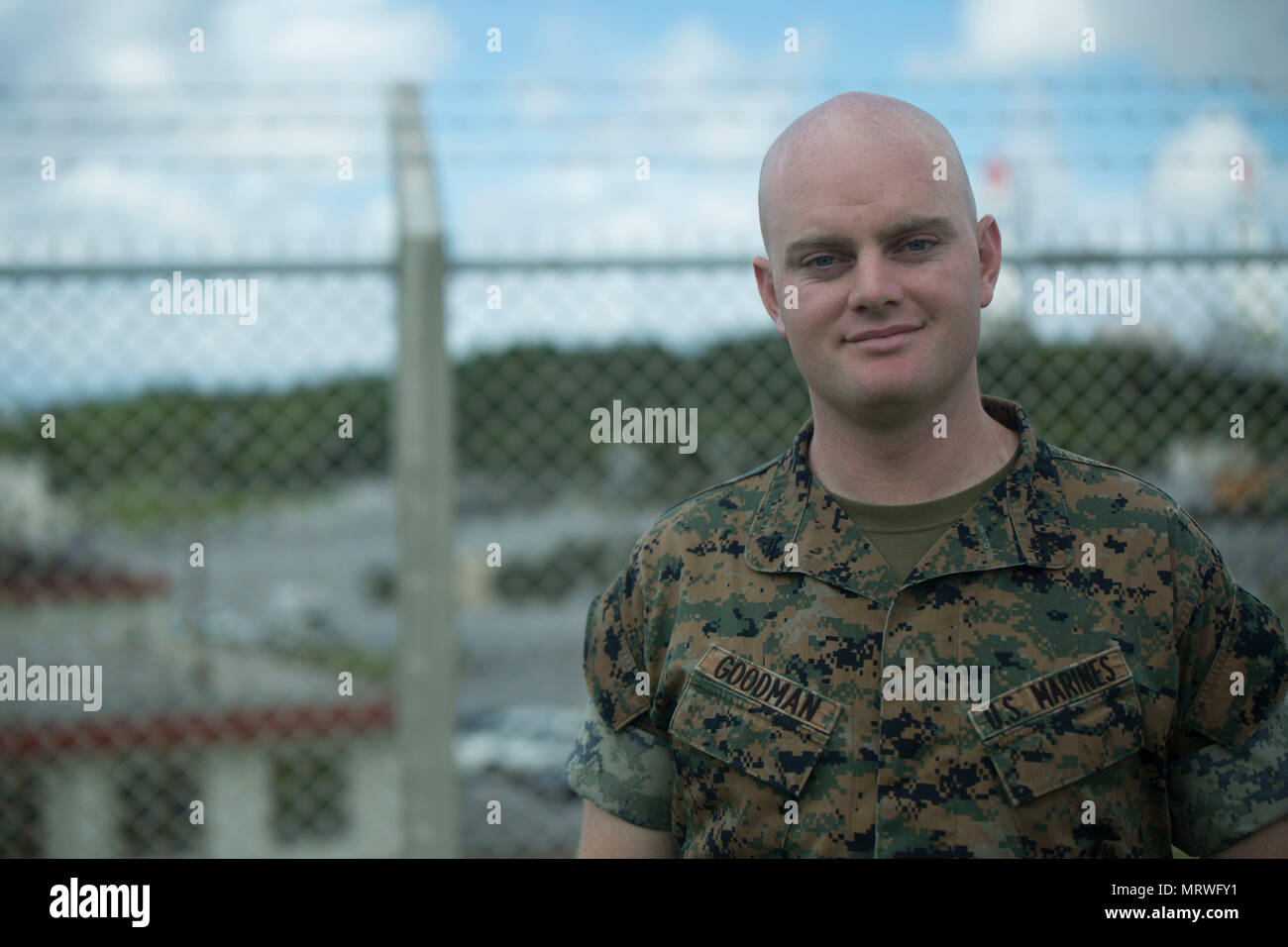 U.S. Marine Cpl. Eric Goodman was one of the five Marines to assist a local Japanese woman on his way down Mount Fuji, Japan, July 3, 2017. The woman, Moe Oda, was found lying on the ground,  hyperventilating and struggling to breathe when the Marines came to her assistance. Together, they created a makeshift stretcher to carry her down approximately two miles to get to medical assistance. Goodman, a 26 year old, Grass Valley, California  native, is a ground radio repairman with Electronics Maintenance Company, 3d Maintenance Battalion, Combat Logistics Regiment 35, 3d Marine Logistics Group,  Stock Photo