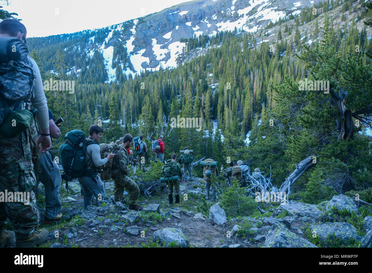 Special Operations Advanced Mountaineering School students lead a force