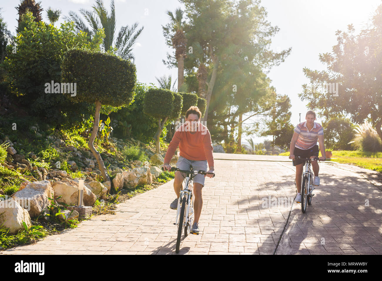 Man boy riding bicycles hi-res stock photography and images - Alamy