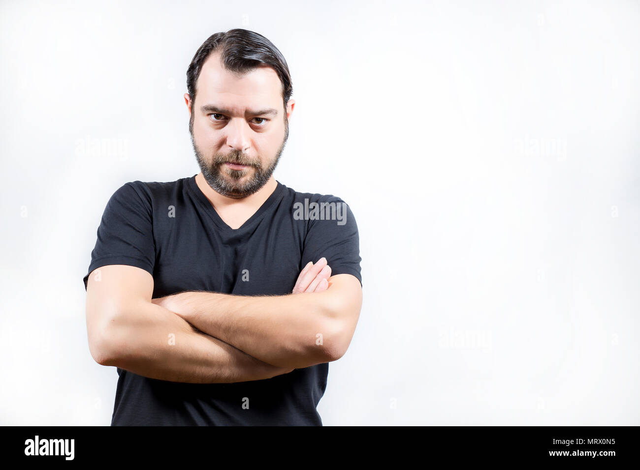 Cool man crossed arms hi-res stock photography and images - Alamy
