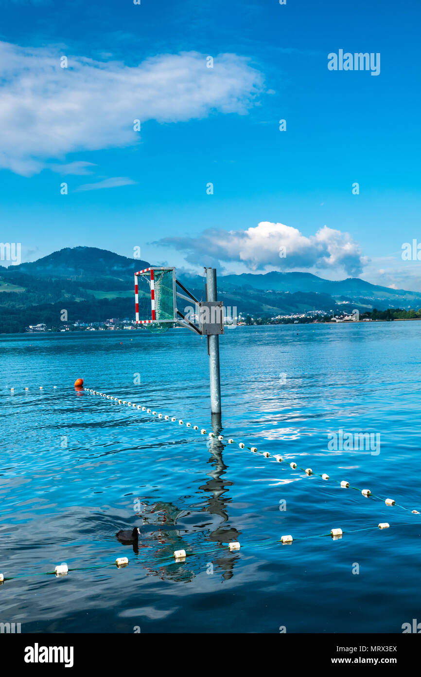 Kayak water polo and basketball installations on the shores of the