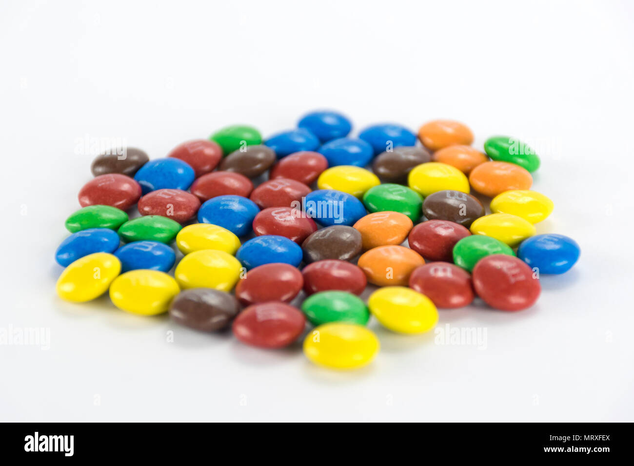 Packet of crispy M&M's on white background Stock Photo - Alamy