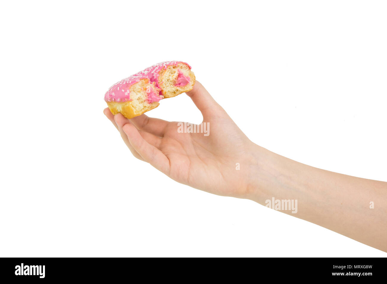 Hold Handing Delicious Pink Bitten Donut With Pink Cream Inside. Isolated On White Background Stock Photo