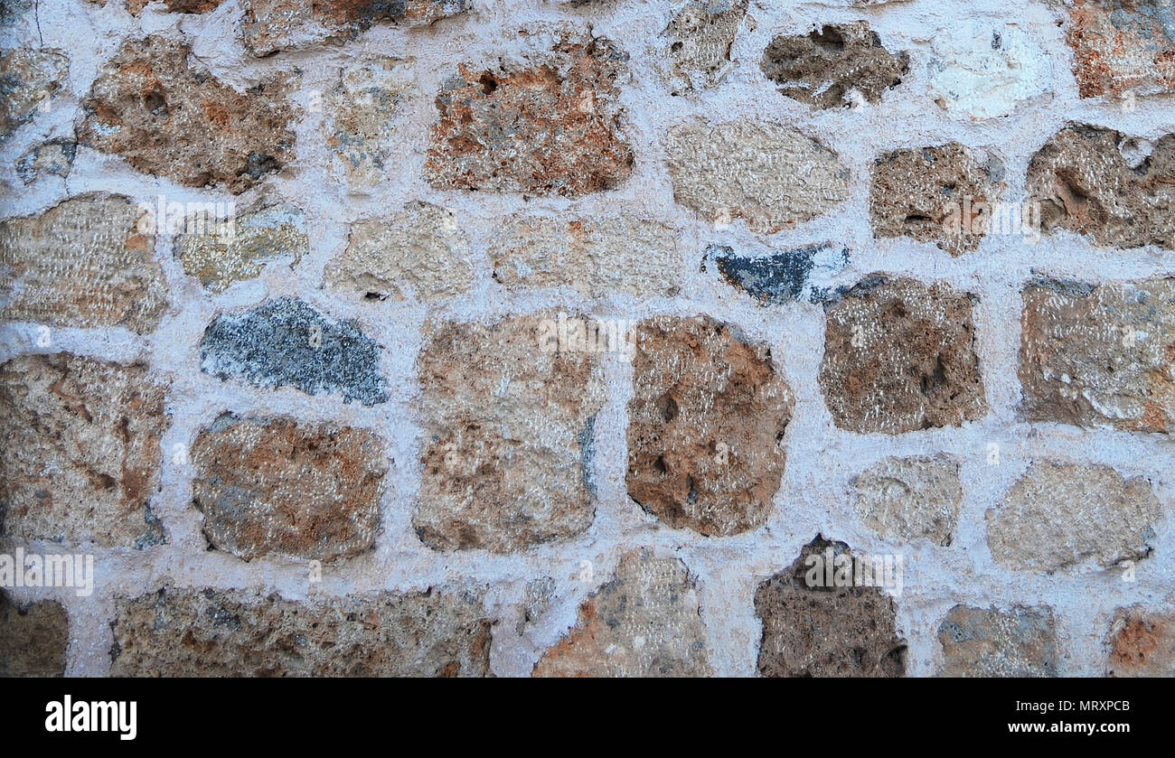 Texture of a stone wall from blocks of sandstone Stock Photo