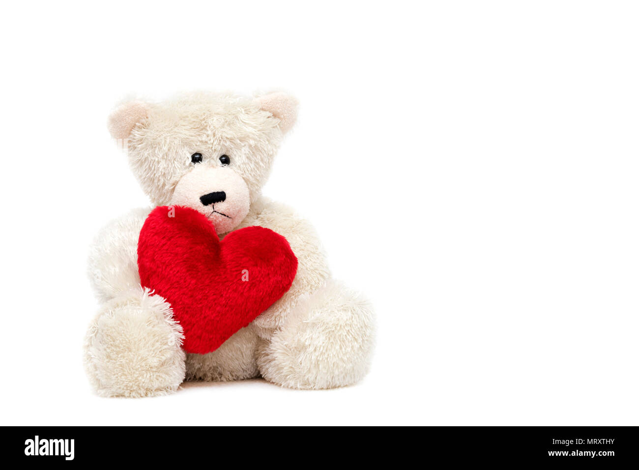 Teddy bear with red heart. Stock Photo