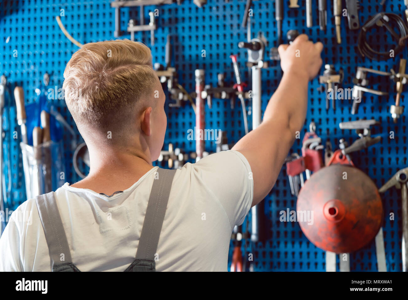 Rear view male auto mechanic hi-res stock photography and images - Alamy