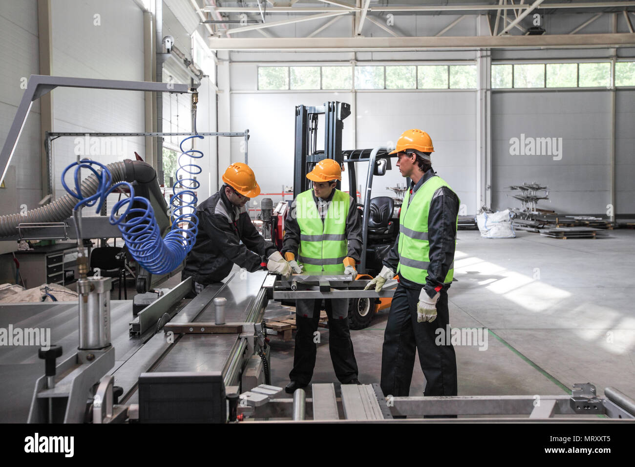 CNC machine shop with lathes, technicians and workers Stock Photo Alamy