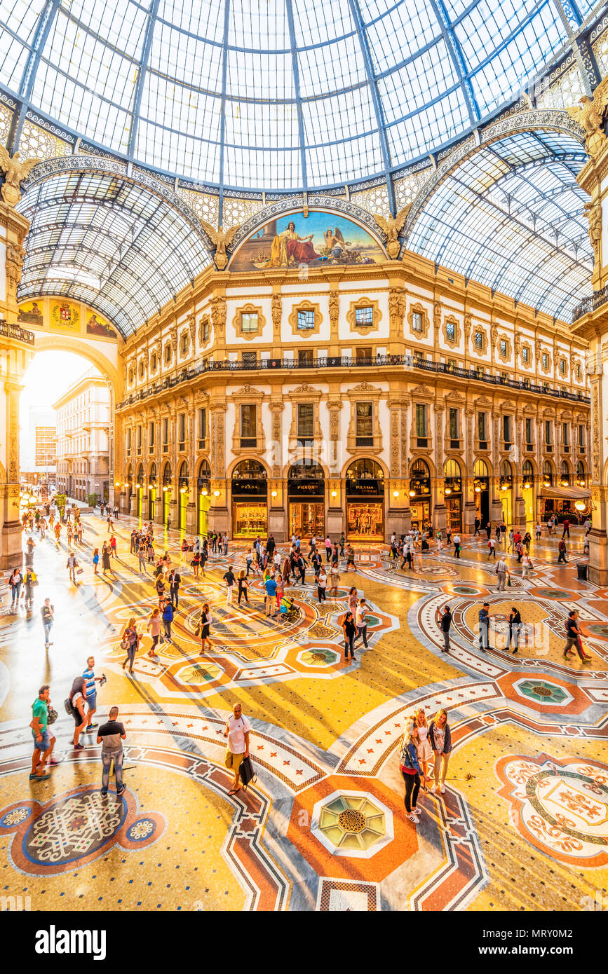 Galleria Vittorio Emanuele II, Milan, Lombardy, Italy. Tourists walking in the world's oldest shopping mall. Stock Photo